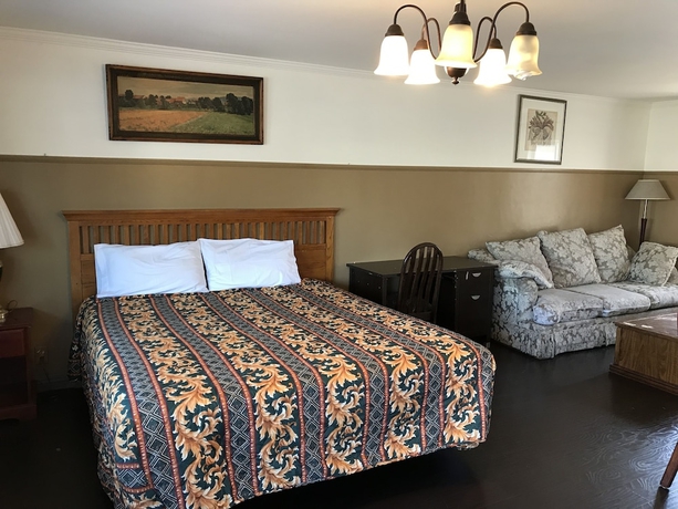 Imagen de la habitación del Hotel Sunshine Village Motel. Foto 10