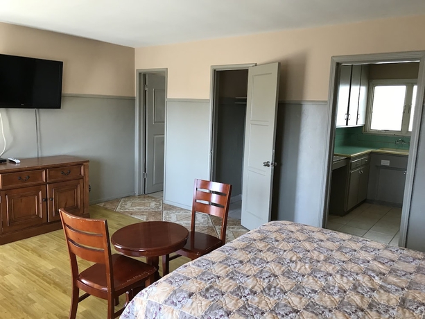 Imagen de la habitación del Hotel Sunshine Village Motel. Foto 11