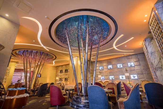 Imagen del bar/restaurante del Hotel Sunshine Zhangjiajie. Foto 2