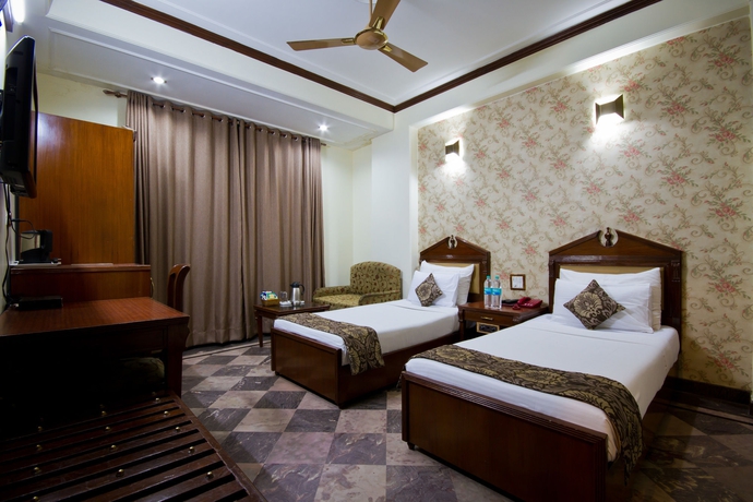 Imagen de la habitación del Hotel Sunstar Grand. Foto 9