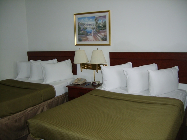 Imagen de la habitación del Hotel Sunstyle Suites. Foto 8