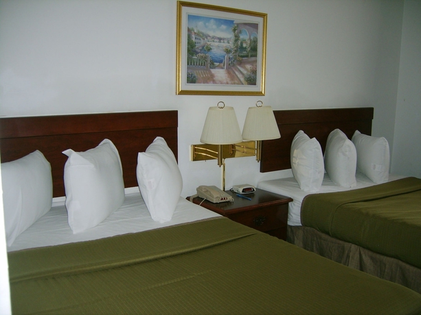 Imagen de la habitación del Hotel Sunstyle Suites. Foto 9