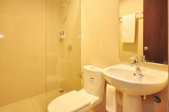 Imagen de la habitación del Hotel Sunwood Arianz Managed By Bencoolen. Foto 3