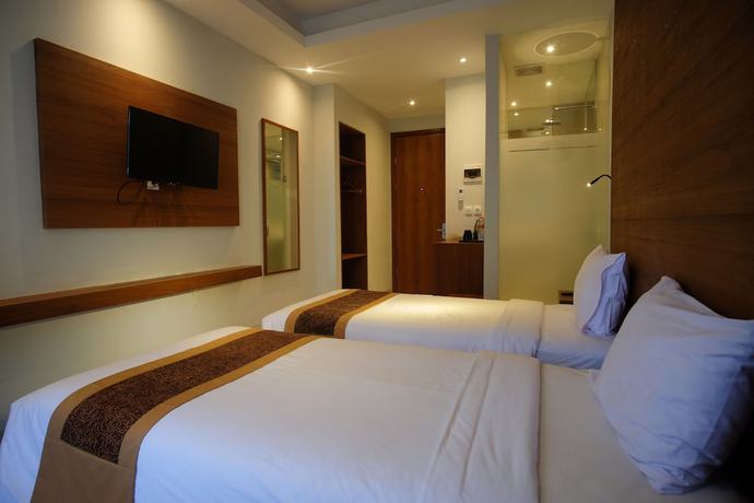 Imagen de la habitación del Hotel Sunwood Arianz Managed By Bencoolen. Foto 6