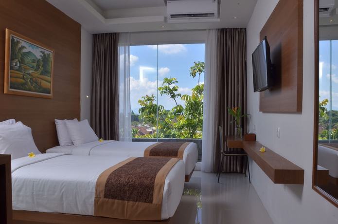 Imagen de la habitación del Hotel Sunwood Arianz Managed By Bencoolen. Foto 11