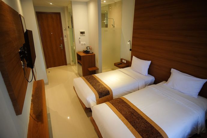 Imagen de la habitación del Hotel Sunwood Arianz Managed By Bencoolen. Foto 13