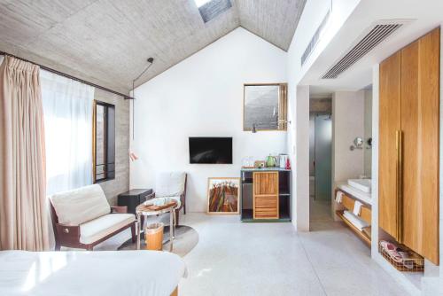 Imagen de la habitación del Hotel Sunyata Dali. Foto 8