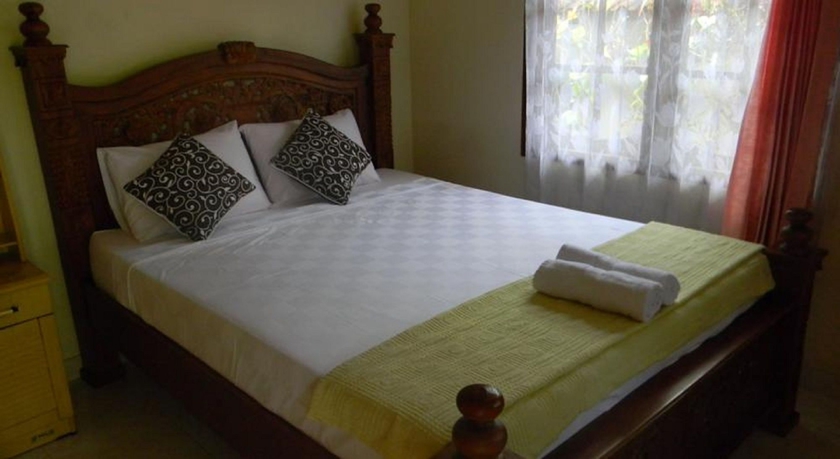 Imagen de la habitación del Hotel Suparsa's Home Stay. Foto 5