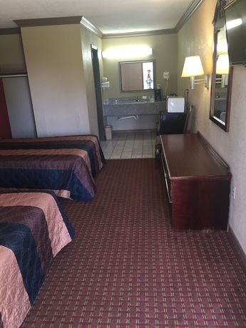 Imagen de la habitación del Hotel Super 6 Inn. Foto 10
