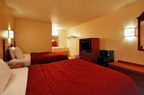 Imagen de la habitación del Hotel Super 6 Inn & Suites Pensacola. Foto 3