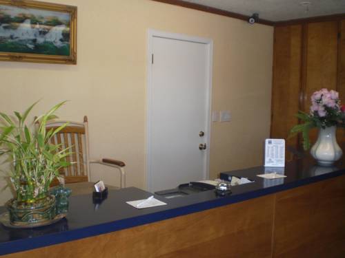 Imagen de la habitación del Hotel Super 7 Inn Siloam Springs. Foto 2