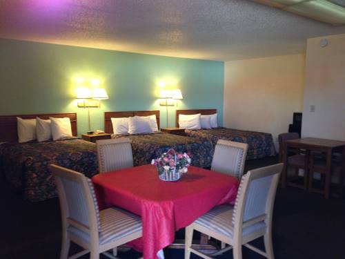 Imagen de la habitación del Hotel Super 7 Inn Siloam Springs. Foto 4