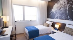 Imagen de la habitación del Hotel Super 8 Aeroporto Confins. Foto 6