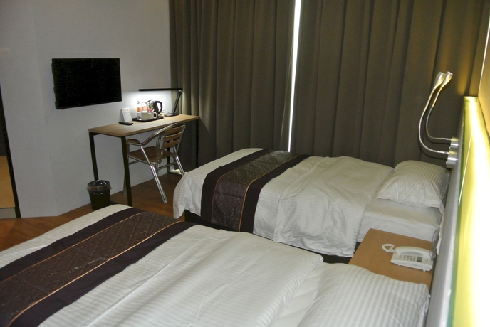 Imagen de la habitación del Hotel Super 8 @ Bayan Baru. Foto 2