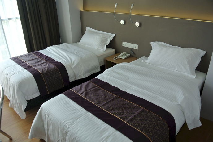 Imagen de la habitación del Hotel Super 8 @ Bayan Baru. Foto 3
