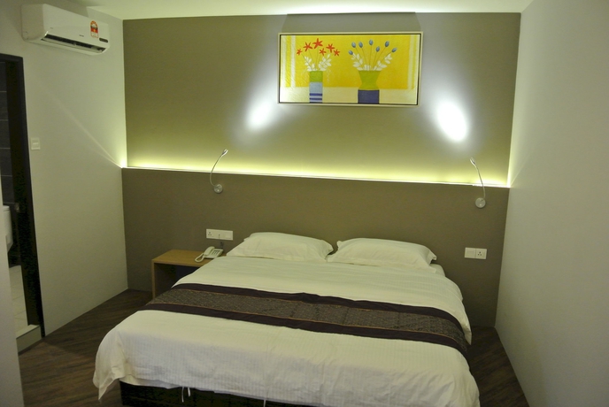 Imagen de la habitación del Hotel Super 8 @ Bayan Baru. Foto 8