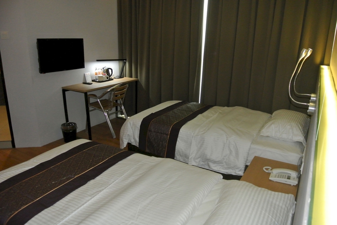 Imagen de la habitación del Hotel Super 8 @ Bayan Baru. Foto 9