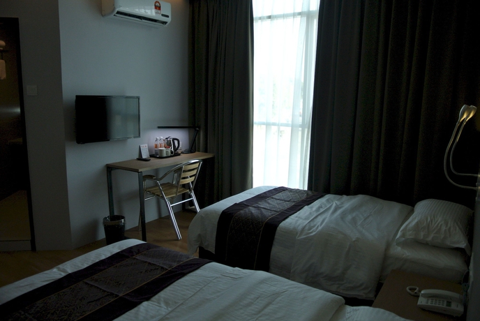 Imagen de la habitación del Hotel Super 8 @ Bayan Baru. Foto 11