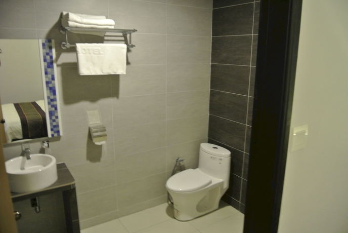 Imagen de la habitación del Hotel Super 8 @ Bayan Baru. Foto 13