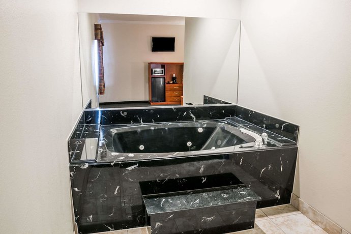 Imagen de la habitación del Hotel Super 8 By Wyndham Brookshire Tx. Foto 8