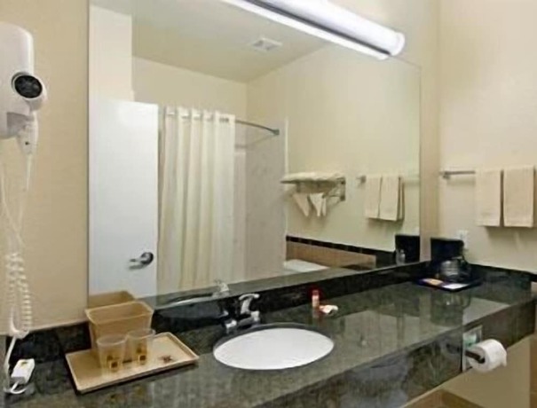 Imagen de la habitación del Hotel Super 8 By Wyndham Brookshire Tx. Foto 9