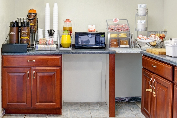 Imagen del bar/restaurante del Hotel Super 8 By Wyndham Clarksville East. Foto 3