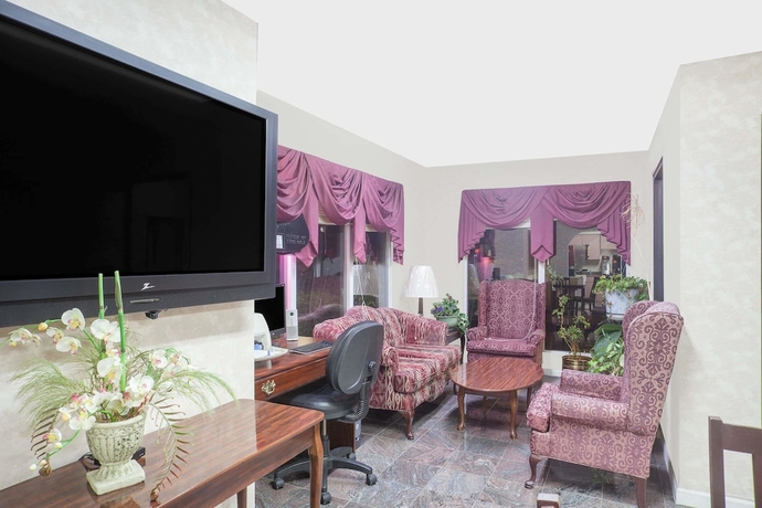 Imagen de los interiores del Hotel Super 8 By Wyndham Decatur Priceville. Foto 16