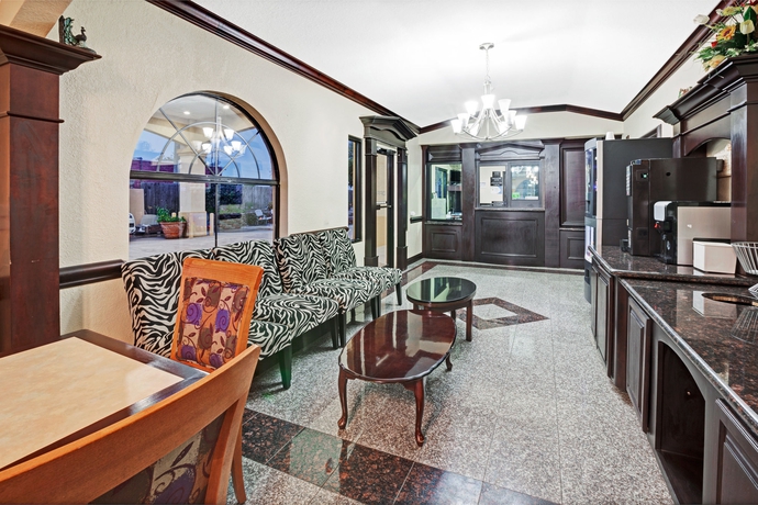 Imagen de los interiores del Hotel Super 8 By Wyndham Houston Hobby Airport South. Foto 12