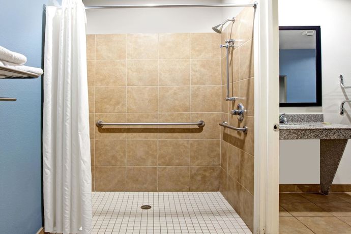 Imagen de la habitación del Hotel Super 8 By Wyndham Houston North I-45. Foto 7