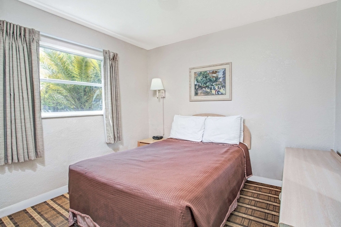 Imagen de la habitación del Hotel Super 8 By Wyndham Kissimmee. Foto 4