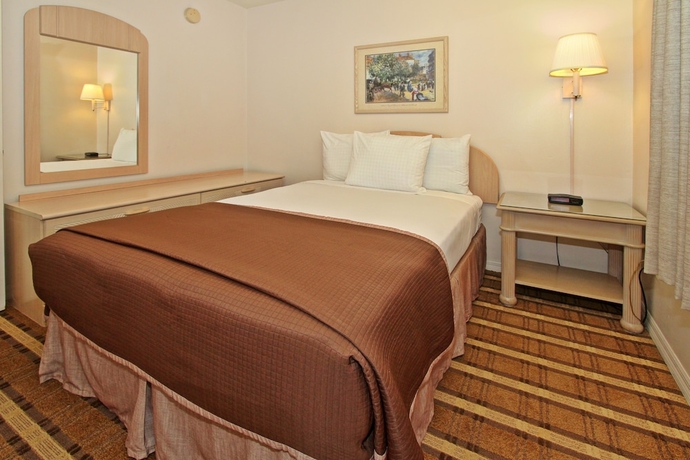 Imagen de la habitación del Hotel Super 8 By Wyndham Kissimmee. Foto 9