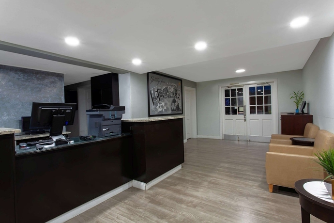 Imagen de los interiores del Hotel Super 8 By Wyndham Kissimmee. Foto 19