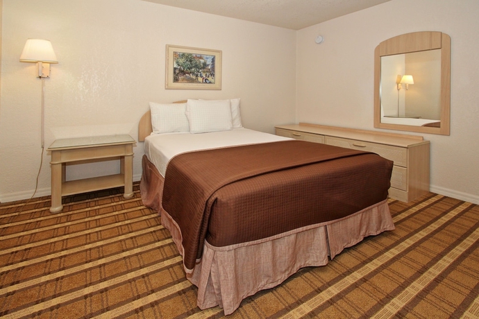 Imagen de la habitación del Hotel Super 8 By Wyndham Kissimmee. Foto 13