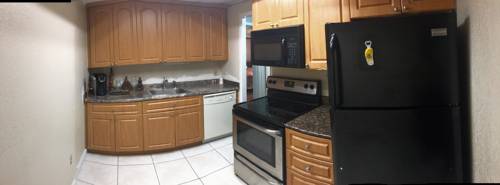 Imagen de la habitación del Hotel Super 8 By Wyndham Lantana West Palm Beach. Foto 7