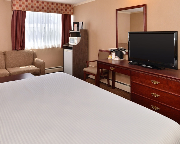 Imagen de la habitación del Hotel Super 8 By Wyndham Macleod Trail Calgary. Foto 5