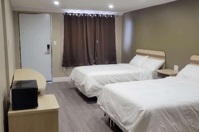 Imagen de la habitación del Hotel Super 8 By Wyndham Niagara Falls On. Foto 6