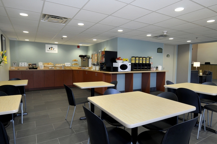 Imagen del bar/restaurante del Hotel Super 8 By Wyndham Peterborough. Foto 1
