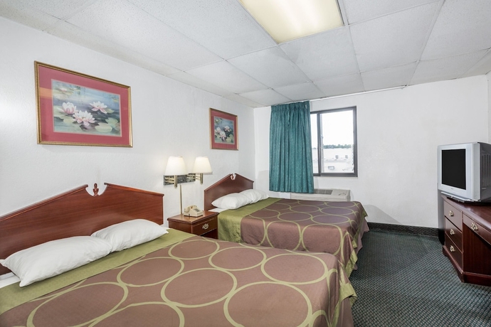 Imagen de la habitación del Hotel Super 8 By Wyndham Pompano Beach. Foto 7