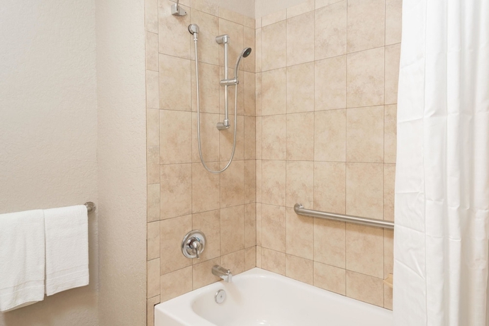 Imagen de la habitación del Hotel Super 8 By Wyndham Pompano Beach. Foto 14