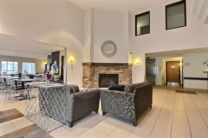 Imagen de los interiores del Hotel Super 8 By Wyndham Quebec City. Foto 17