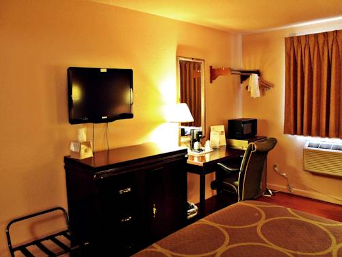 Imagen de la habitación del Hotel Super 8 By Wyndham San Antonio/i-35 North. Foto 11