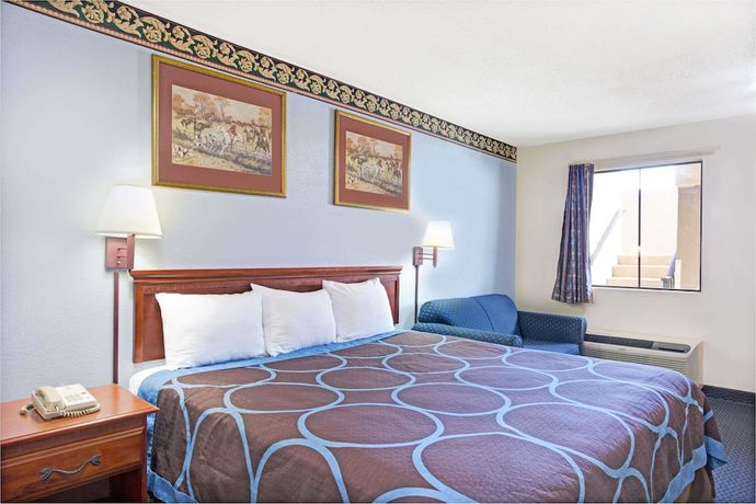 Imagen de la habitación del Hotel Super 8 By Wyndham Suwanee. Foto 8