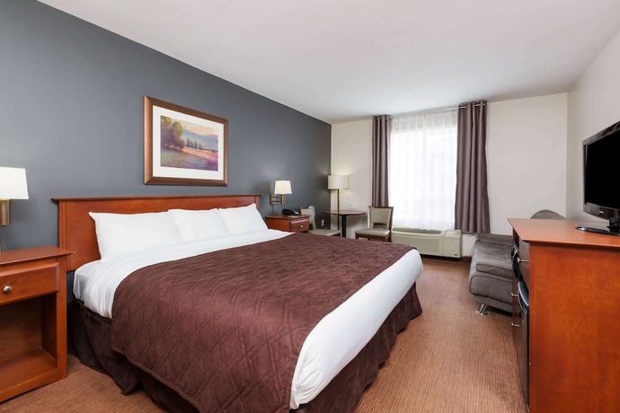 Imagen de la habitación del Hotel Super 8 By Wyndham Trois-rivieres. Foto 1