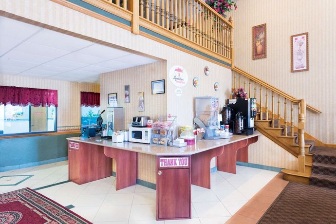 Imagen del bar/restaurante del Hotel Super 8 By Wyndham Troy Il/st. Louis Area. Foto 2