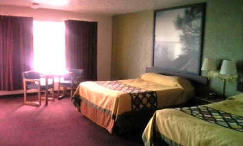 Imagen de la habitación del Hotel Super 8 By Wyndham Wells. Foto 11