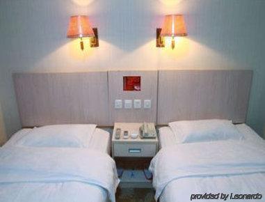 Imagen de la habitación del Hotel Super 8 Changchun. Foto 3