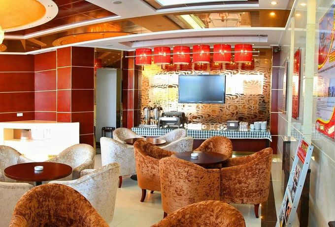 Imagen de la habitación del Hotel Super 8. Foto 14