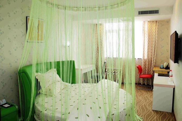 Imagen de la habitación del Hotel Super 8. Foto 12