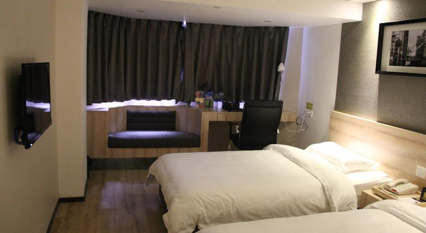 Imagen de la habitación del Hotel Super 8 Hotel Guangzhou San Yuan Li. Foto 5