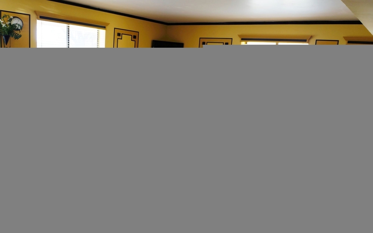 Imagen del bar/restaurante del Hotel Super 8 Naples. Foto 4